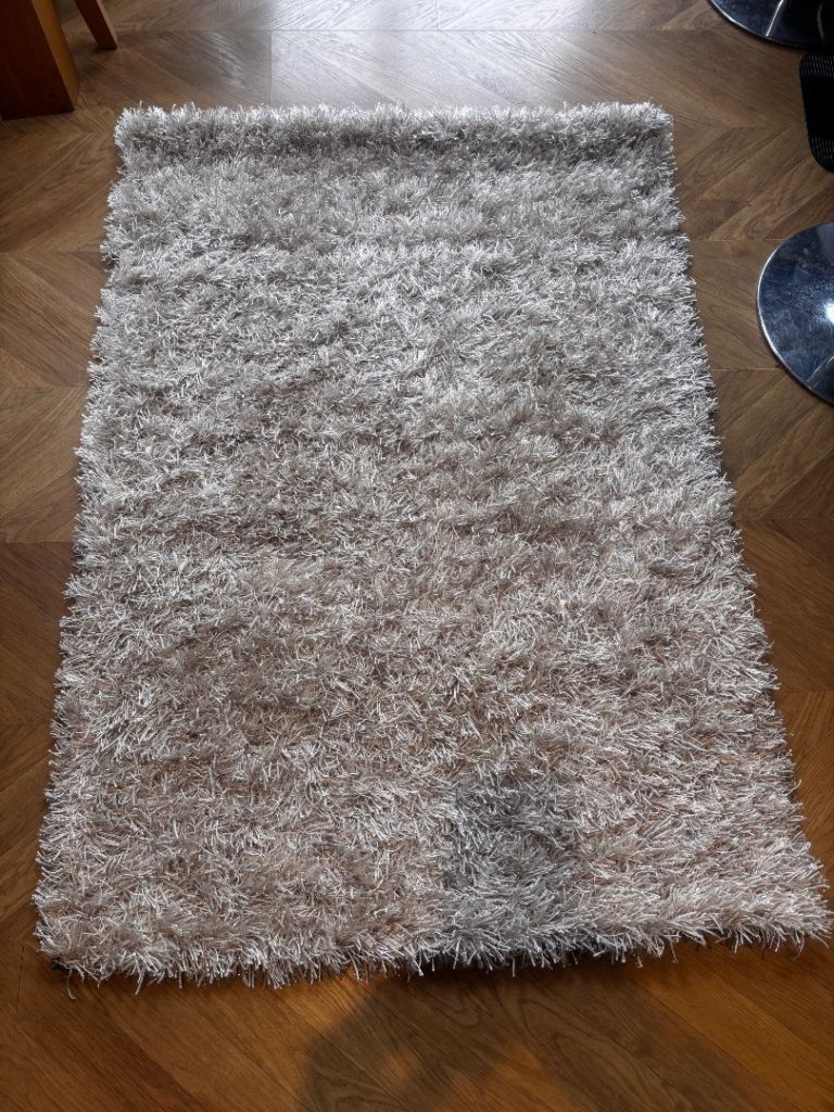 Brand new Champagne coloured fluffy rug