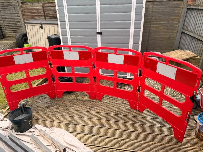 Red folding weatherproof barrier
