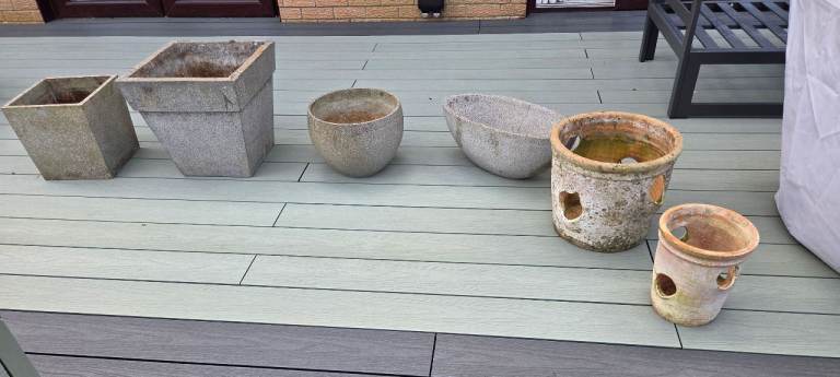 Selection of concrete and terracotta pots