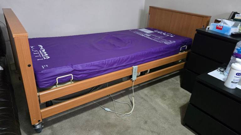 Adjustable Medical Bed with Remote Control – Good Condition
