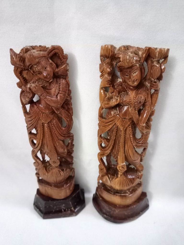 VINTAGE CARVED SANDALWOOD HINDU FIGURES.