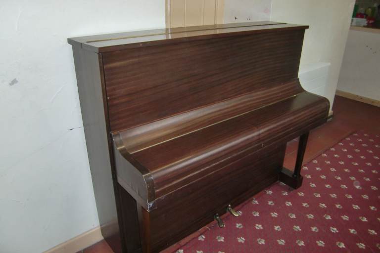 Upright Mahogany Piano