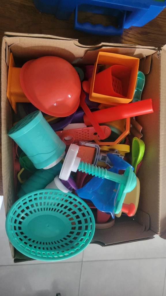 Shoe box of playdough accessories