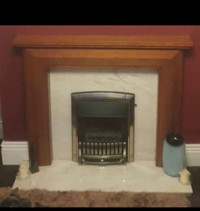Fire surround with marble back and plinth