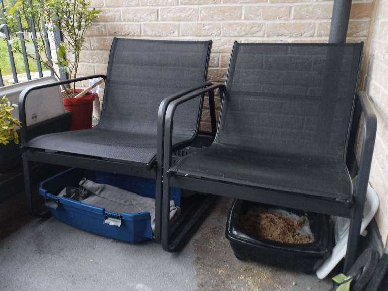 Two metal garden chairs 