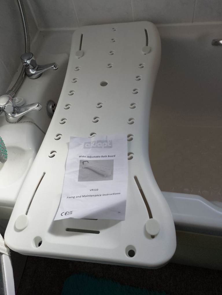 Free... adjustable width bath board new and unused 