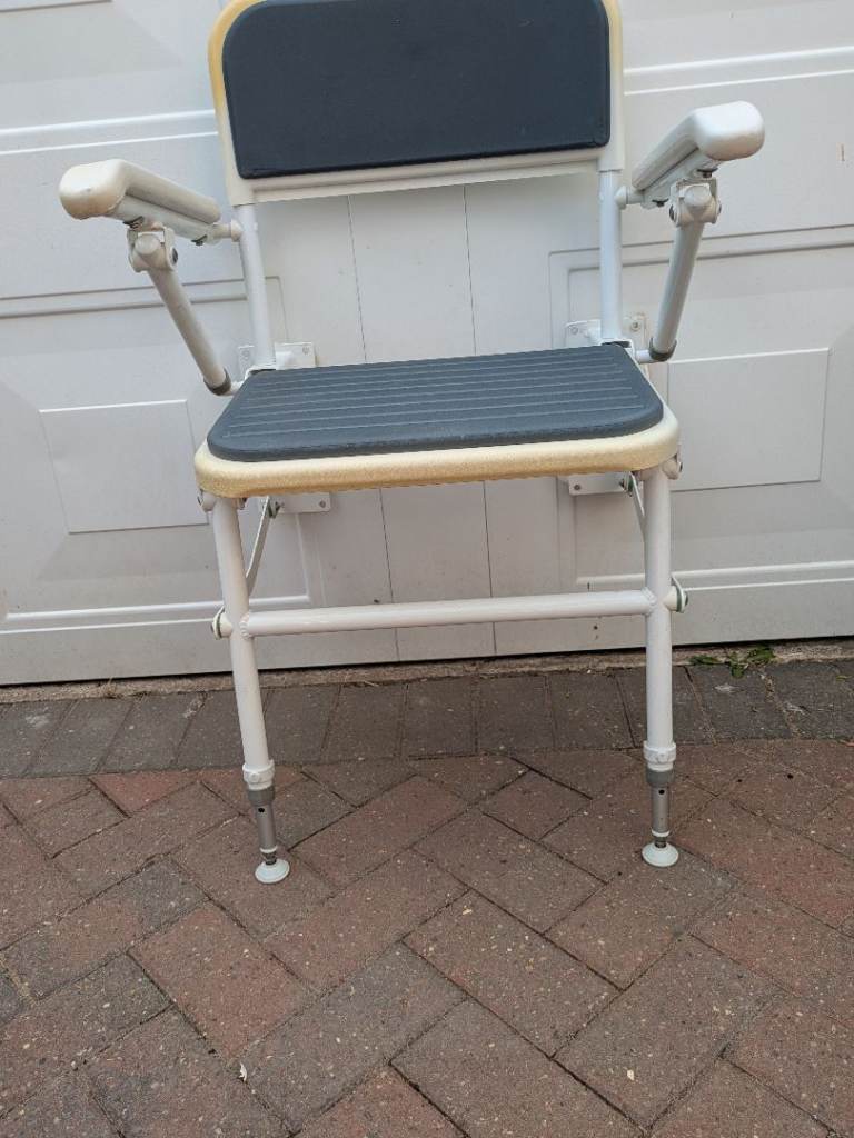 Adjustable shower seat