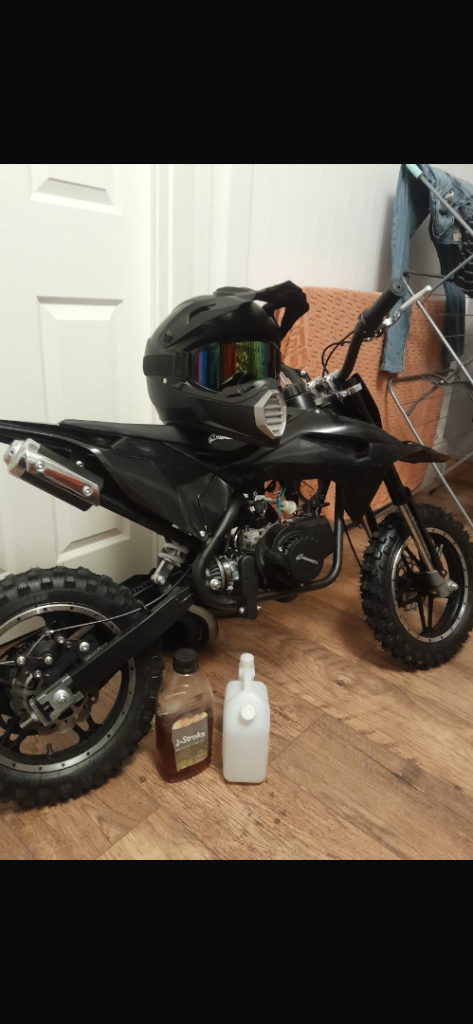 Black Pit Bike with Helmet – Good Condition hawk moto 