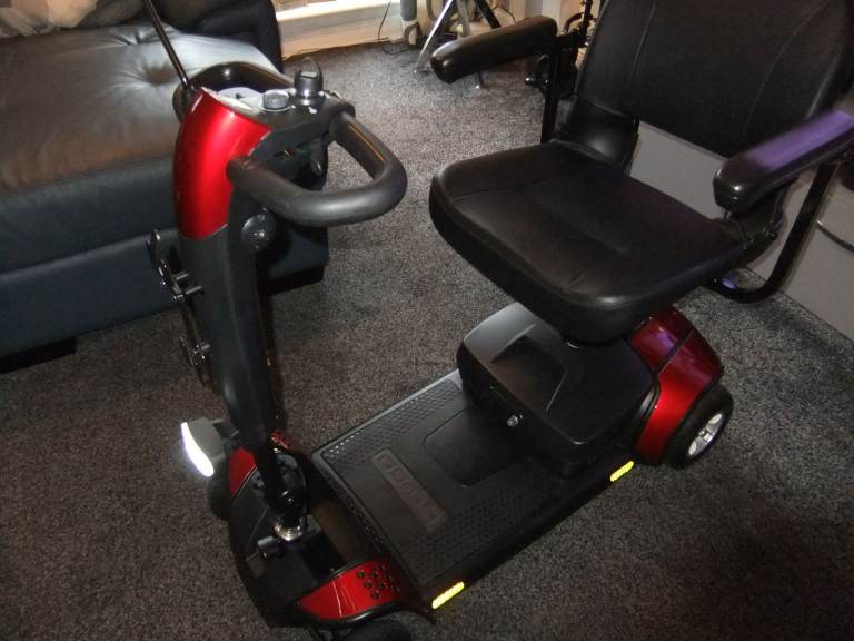 Pride Mobility Scooter,  Go-Go Elite Traveller LX. " Immaculate Condition "