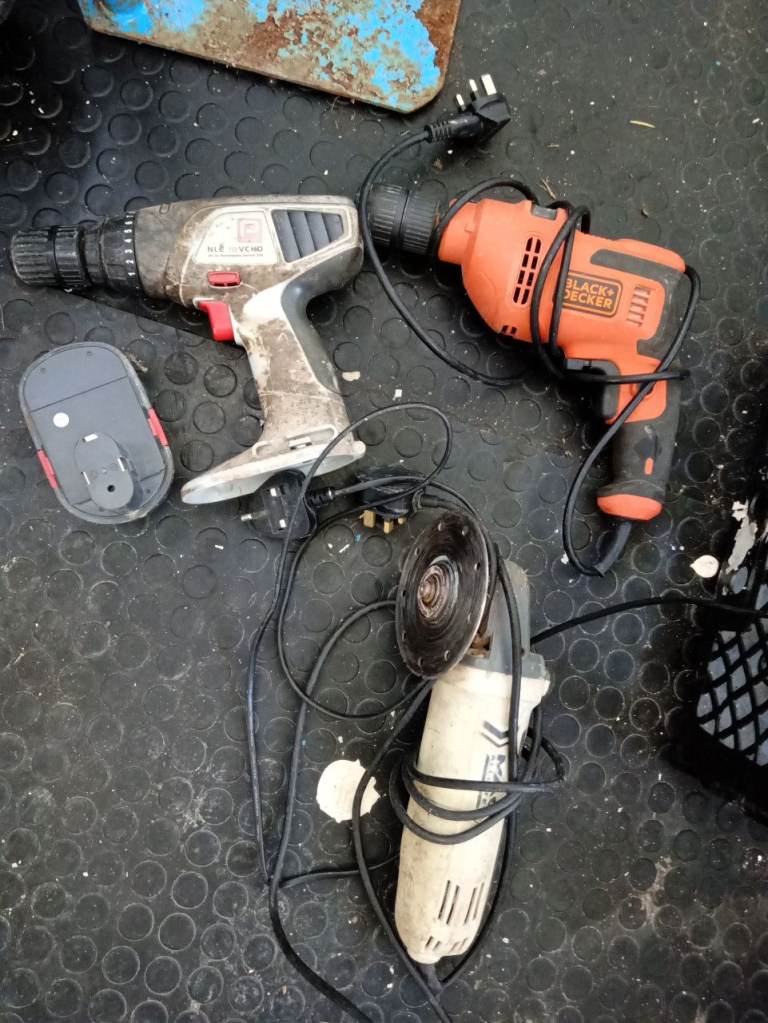 Power drills and grinder with other tools. 
