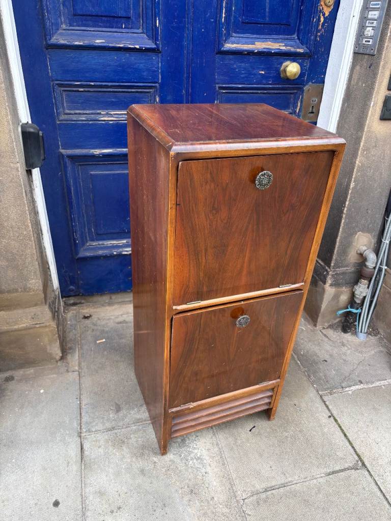 Vintage Bar Cabinet with pull out shelves . Original handles . 