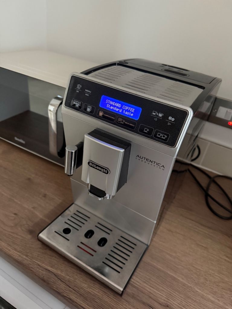 DeLonghi Authentica Cappuccino bean to cup coffee machine w/ Nespresso milk frother