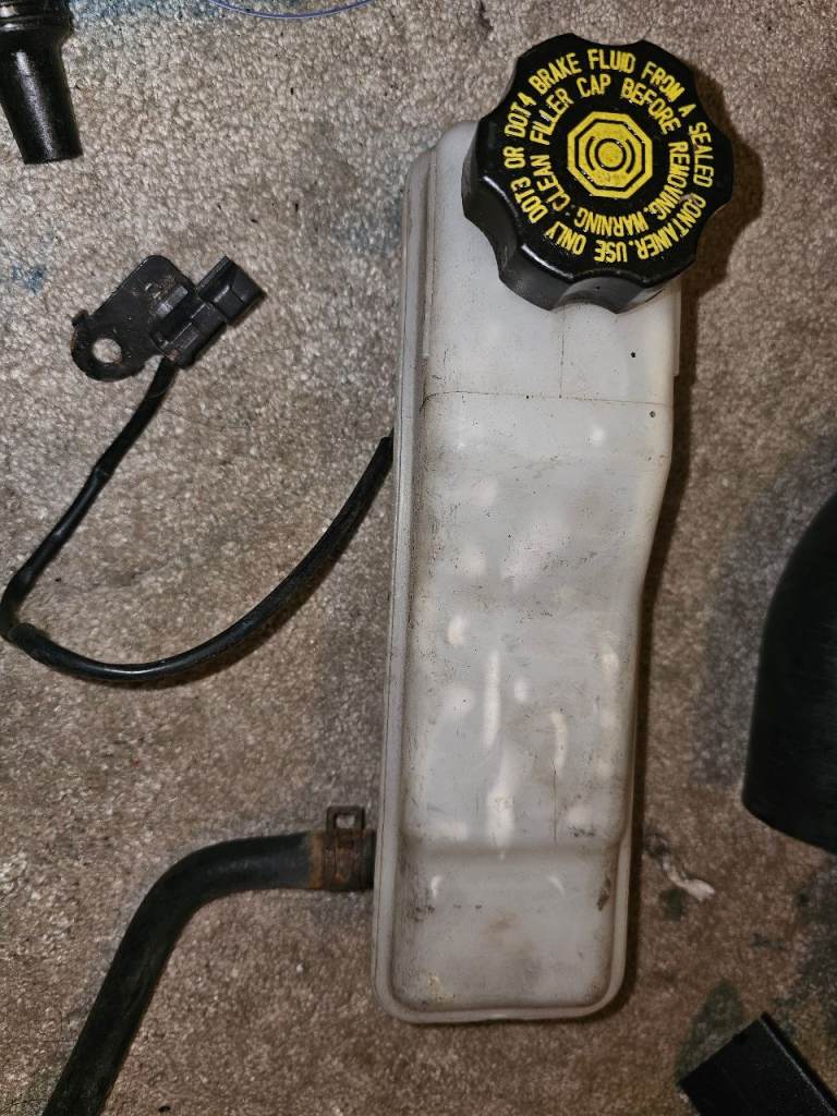 Used OEM Brake Fluid Reservoir Tank Header Bottle with Cap & Sensor 