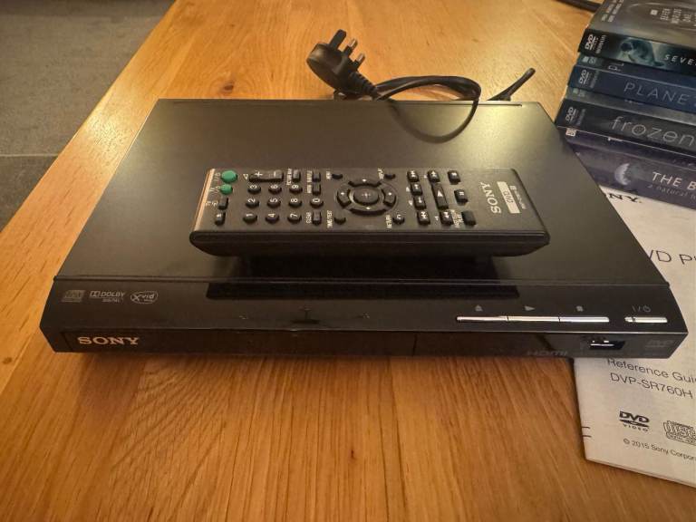 Sony DVP-SR760H DVD /CD player with HD upscaling, black plus free CDs