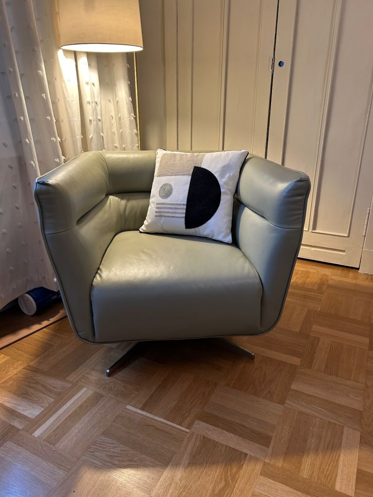 natuzzi leather swivel armchair