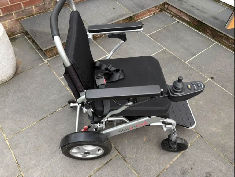 Electric folding wheelchair. Freedom chair a06l with 2 battery's. So double the range. 