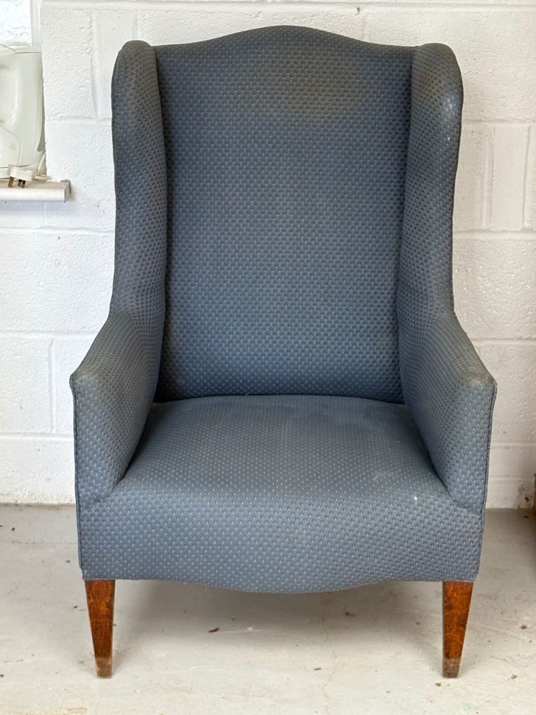 Vintage winged arm chair