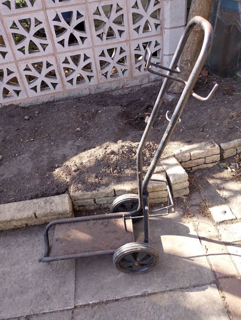 Strong garden pot mover trolley takes large pots