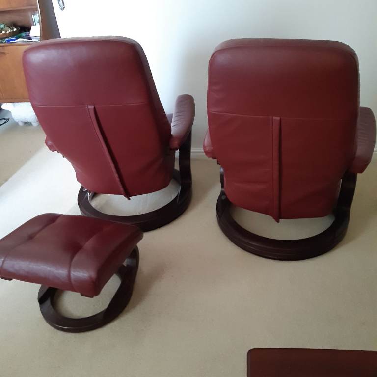 Two recliner arm chairs with one stool
