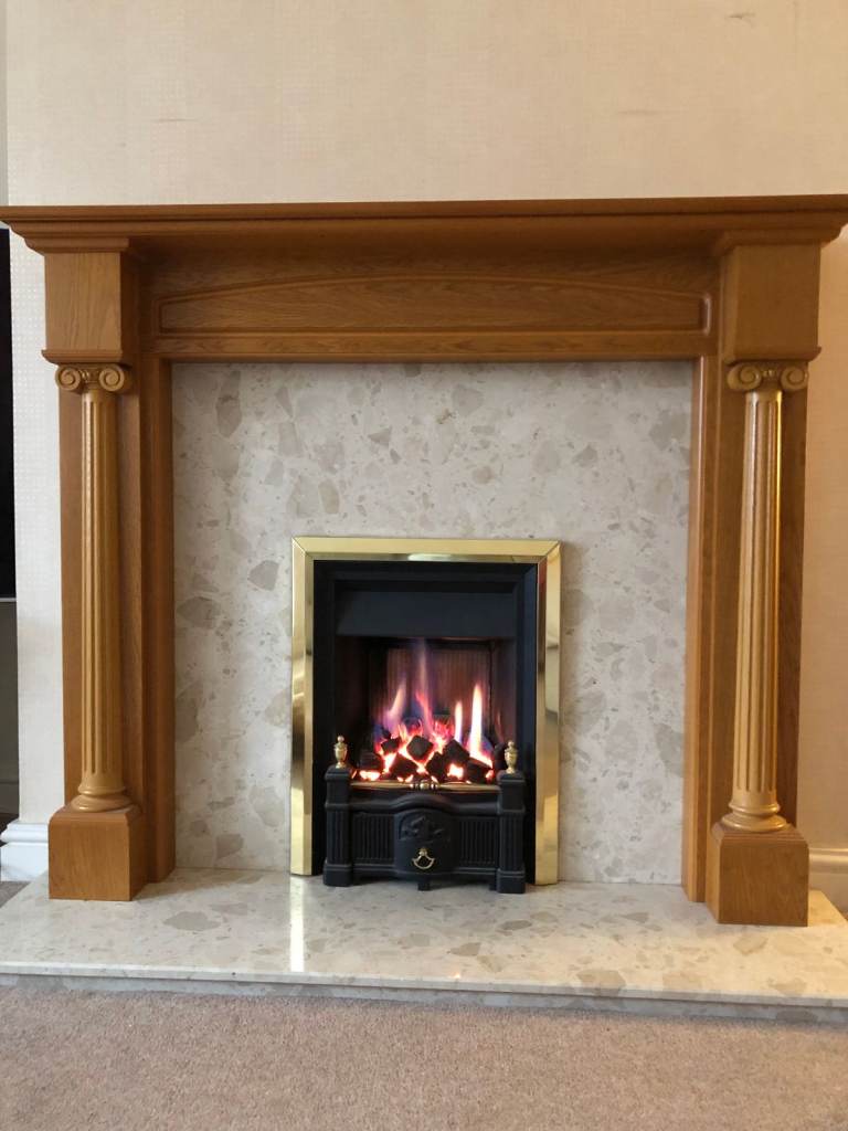 Fireplace with hearth and back.