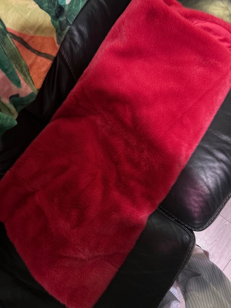 Bright pink fur throw next 