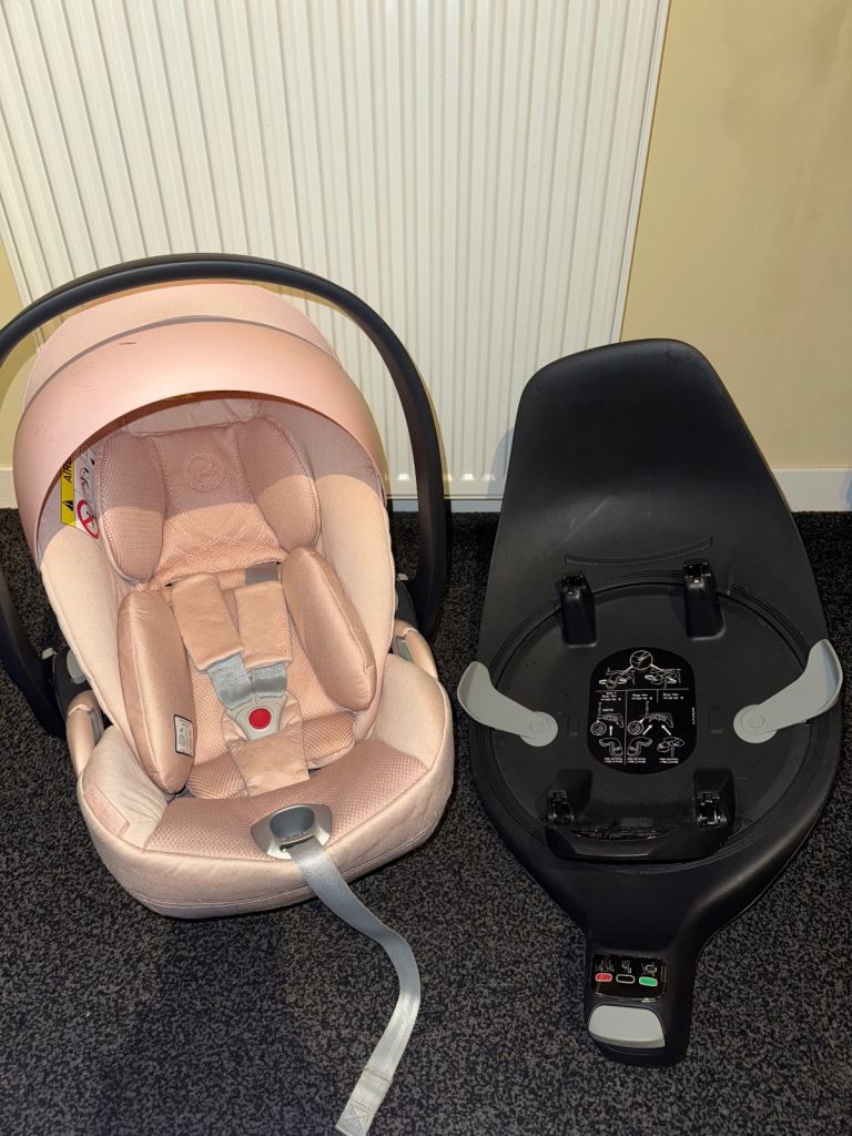 Pink Cybex Cloud T car seat and base 