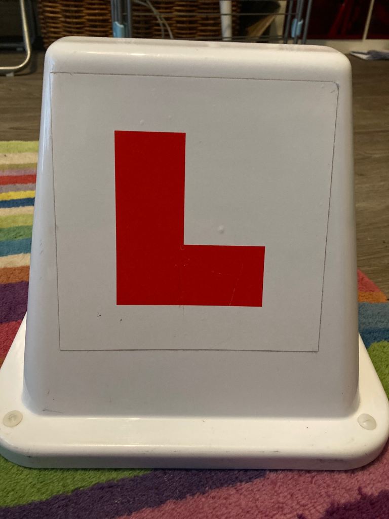 Car roof magnetic learner driver sign. L plates 