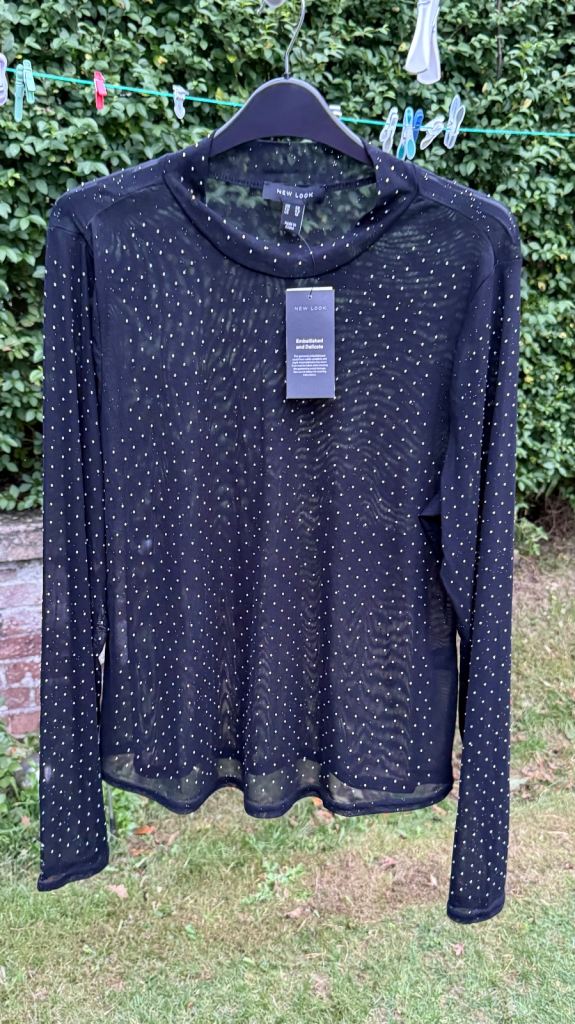 Women’s black sheer stretchy top. Size 20 NEW