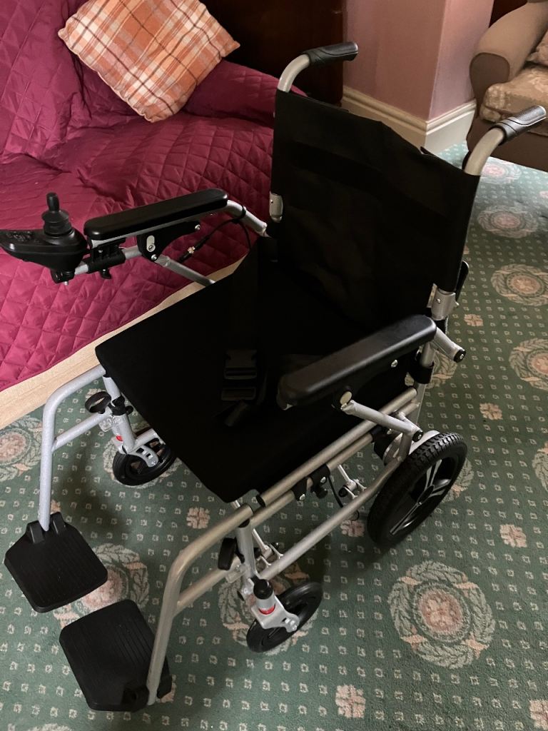 Mobility Plus featherlite electric wheelchair in very good condition 