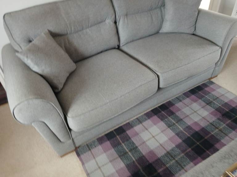 Three seater grey sofa