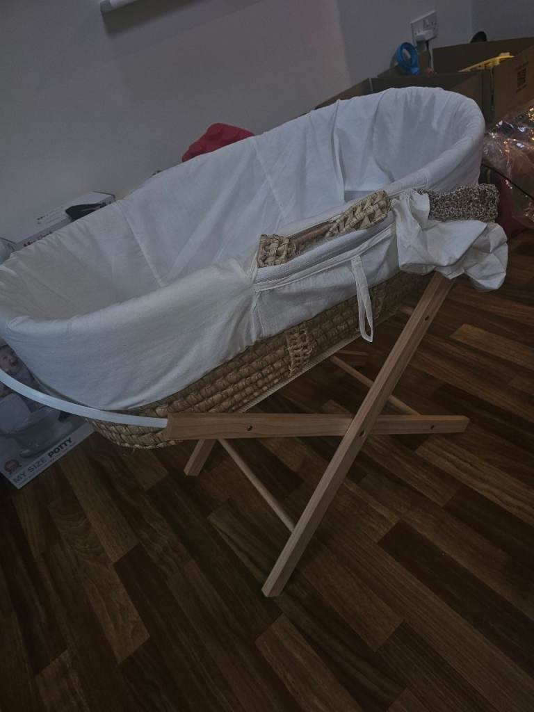 Brand new bassinet with 2 stands 