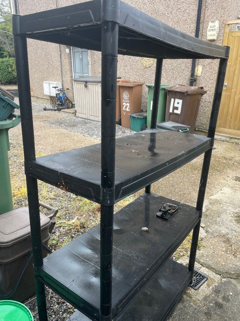  shelves for garden/shed use with four shelves- free 