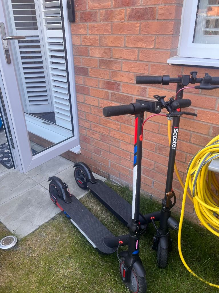 Two Black Electric Scooters - Ready to Go