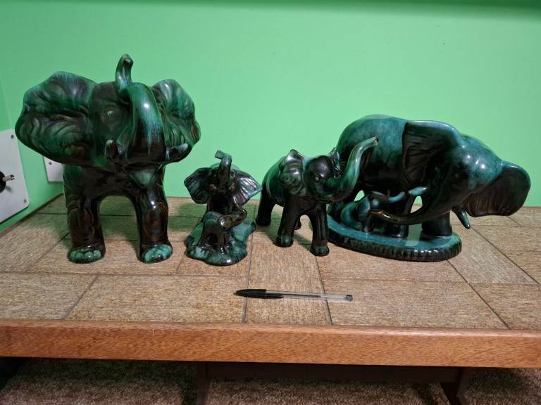 4 vintage Canadian blue  Mountain pottery elephants collectors pieces.