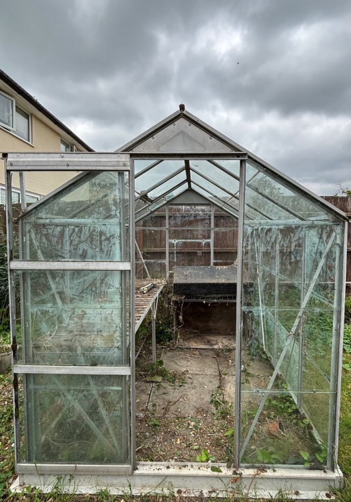 For sale: greenhouse in fair condition. 