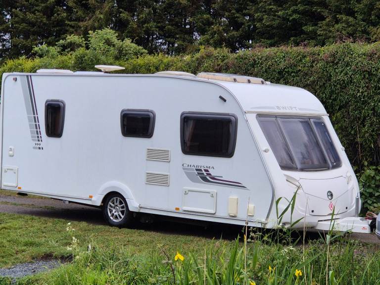 Swift charisma 555 2011 4 berth fixed bed caravan