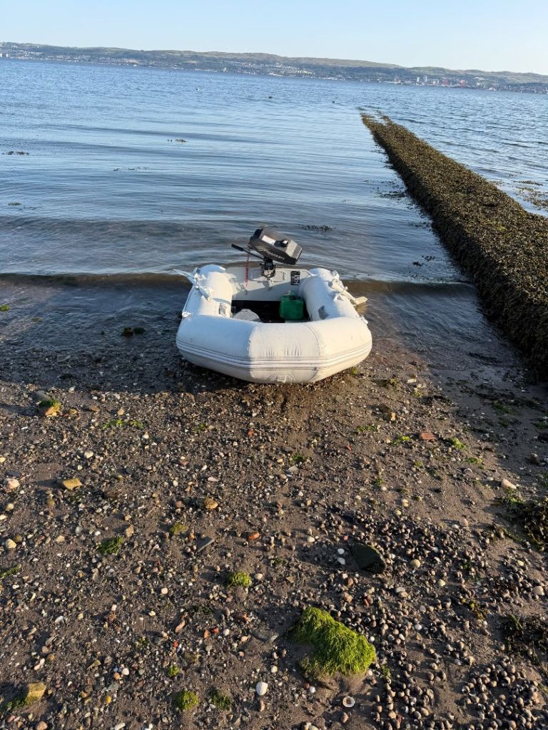 Inflatable Dinghy with Outboard Motor – Good Condition