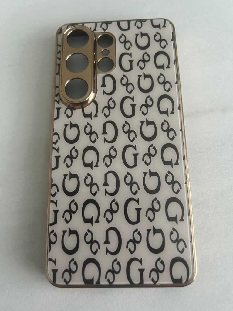Galaxy S26 Ultra Stylish White and Gold Phone Case with 'G' Pattern