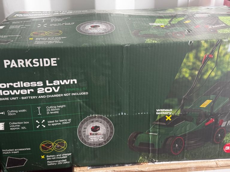 Brand new in box never opens cordless lawnmower 