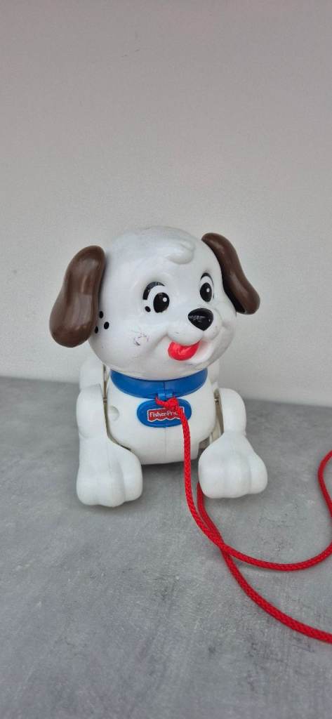 Fisher price pull along dog