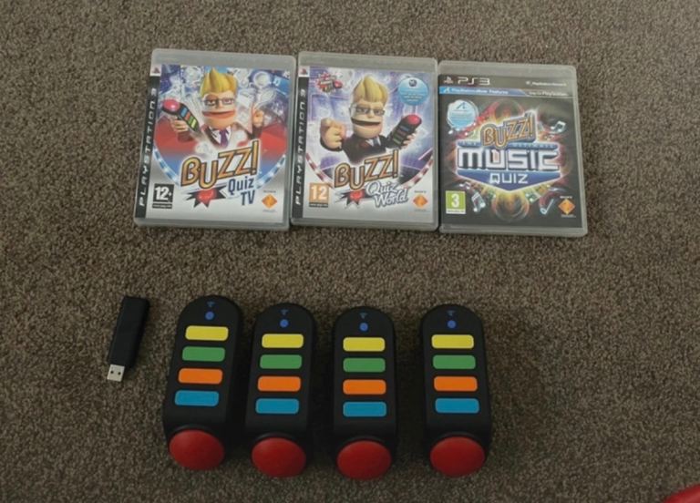Sony PlayStation 3 Buzz Quiz Games and 4 wireless controllers