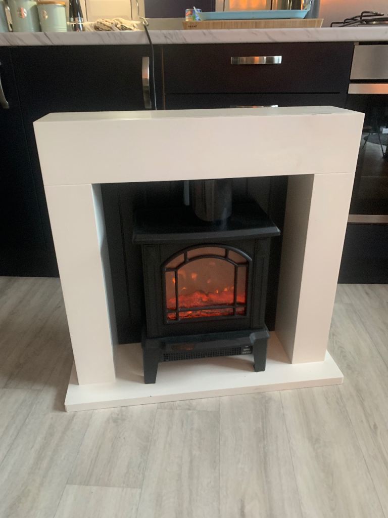 Electric coal effect log fire and surround 