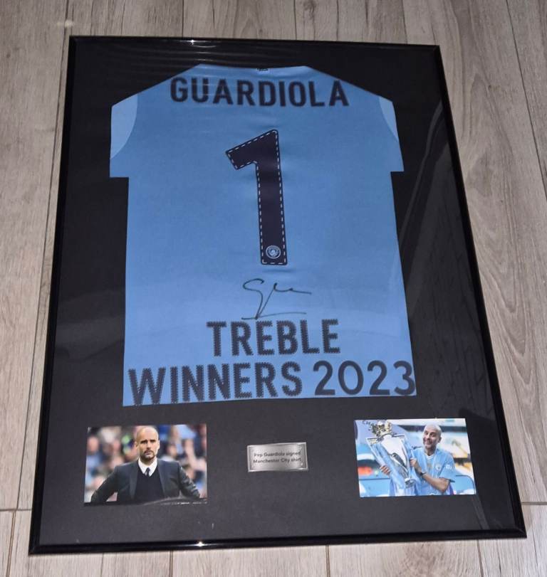 Signed football shirt. Pep guardiola signed Manchester City shirt in frame with proof and COA 