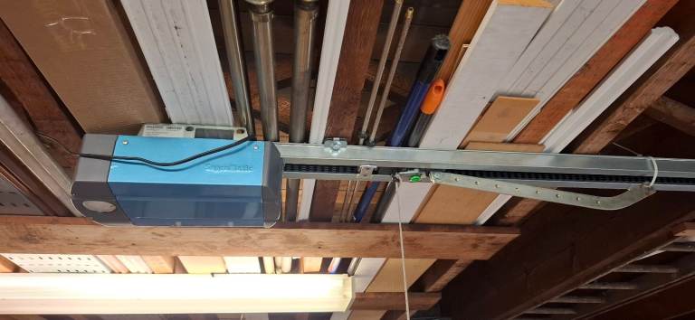 Up and over garage door electric opener