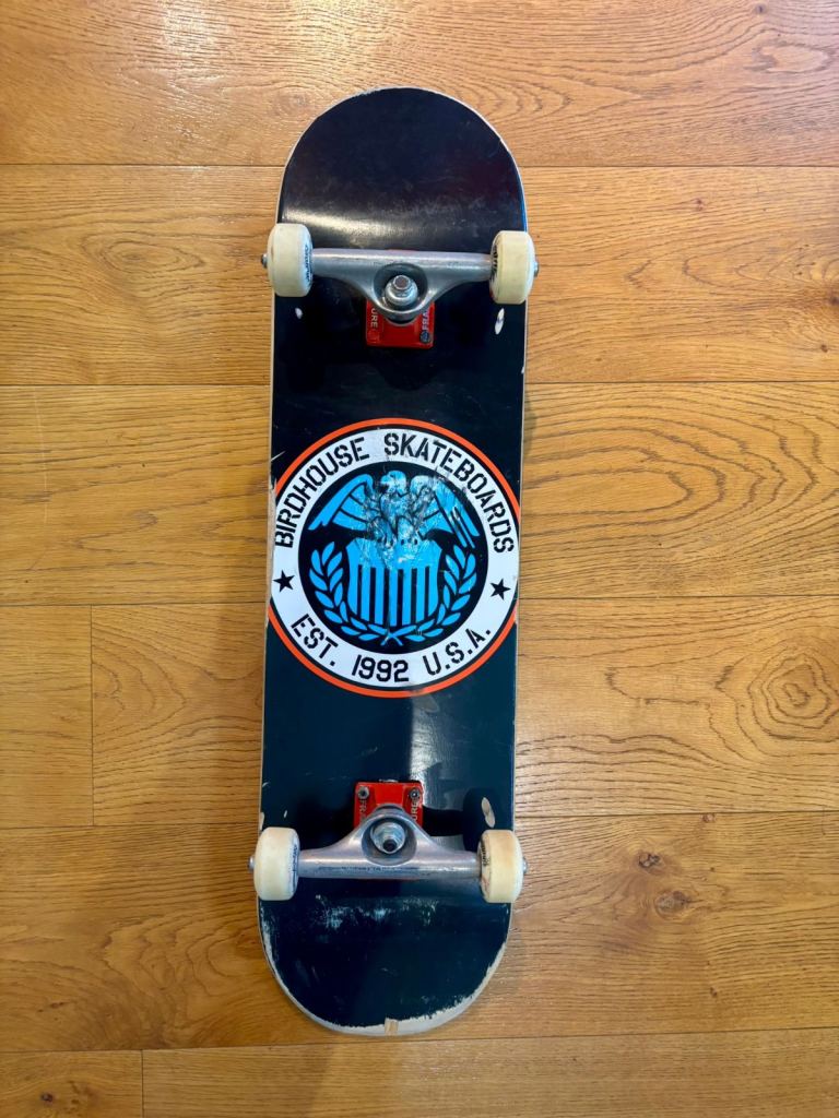 Birdhouse Skateboard with Fracture trucks & Bones Reds Bearings