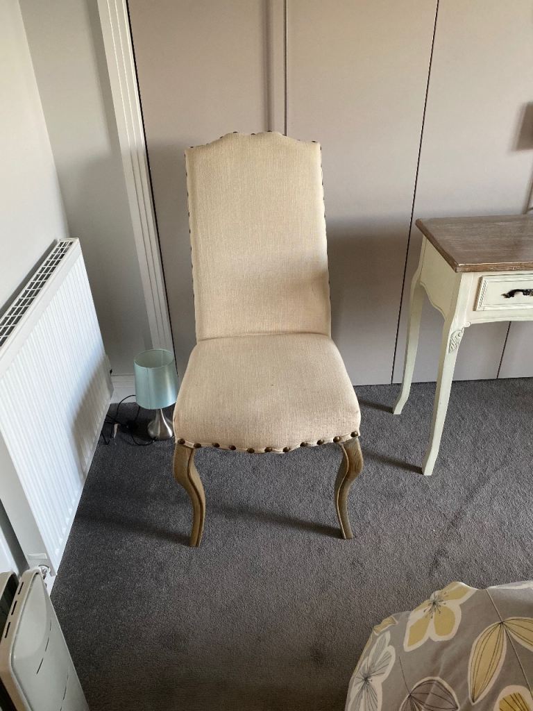 Elegant Beige Fabric Dining Chair with Stud Details