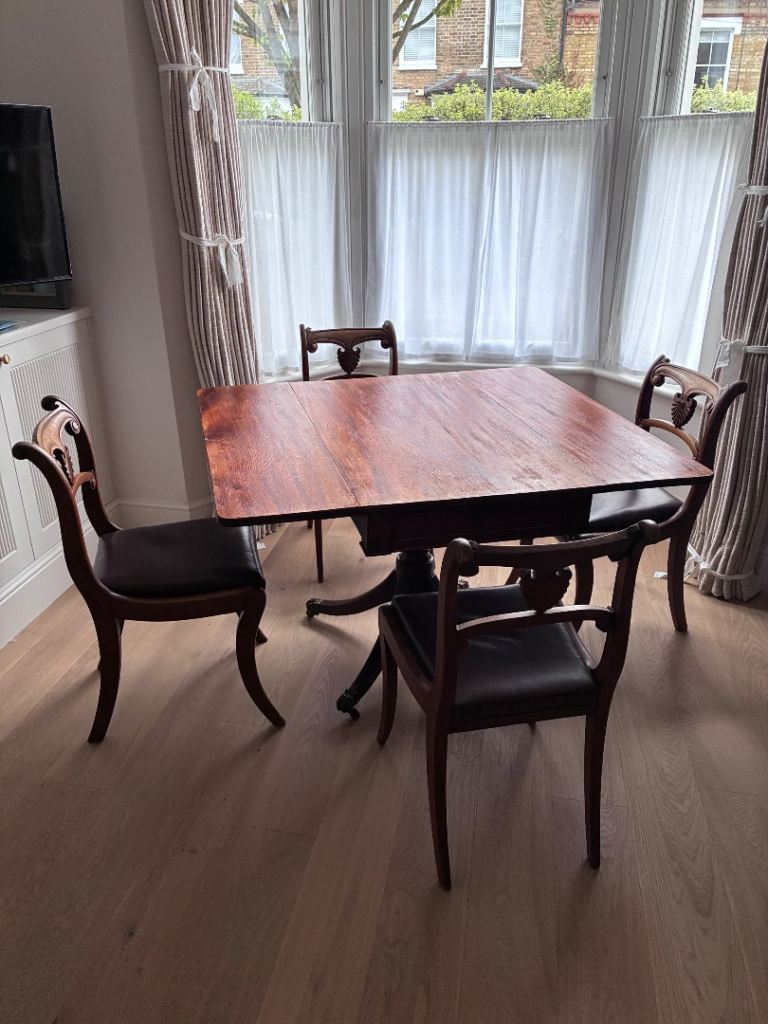 Extendable antique dining table and chairs