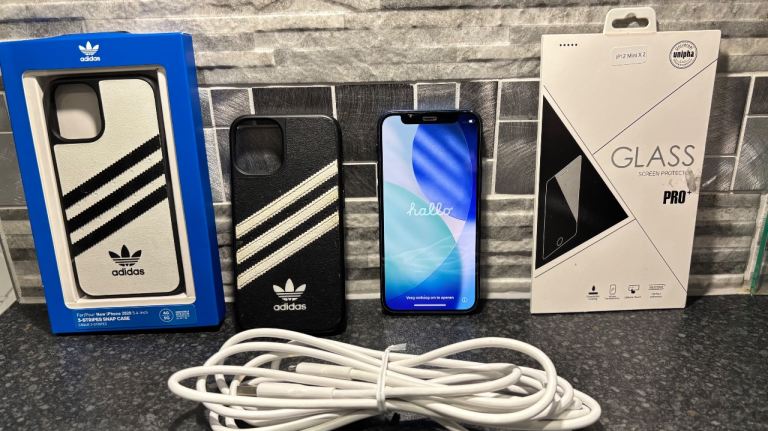 iPhone 12 mini used condition in Blue, 64GB bundle.