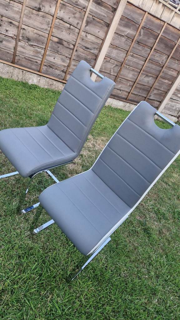 Pair of Grey Dining Chairs with Chrome Legs – Good Condition