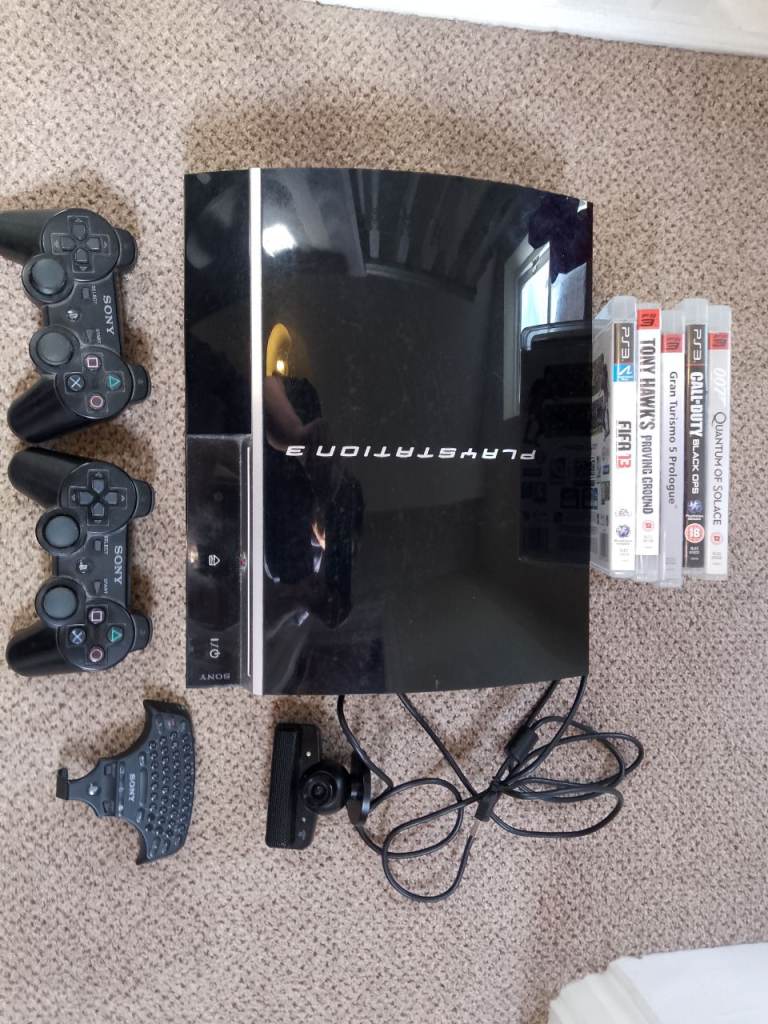 40GB PS3 with 5 games, 2 controllers, keyboard and webcam